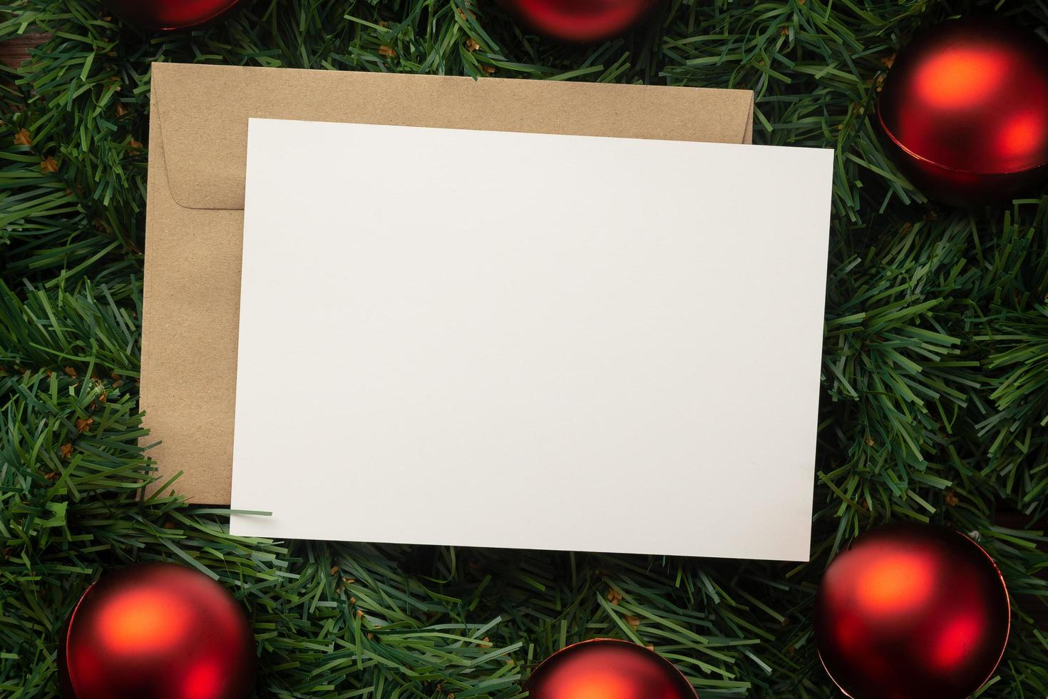 Merry Christmas greeting card and envelope mockup template photo