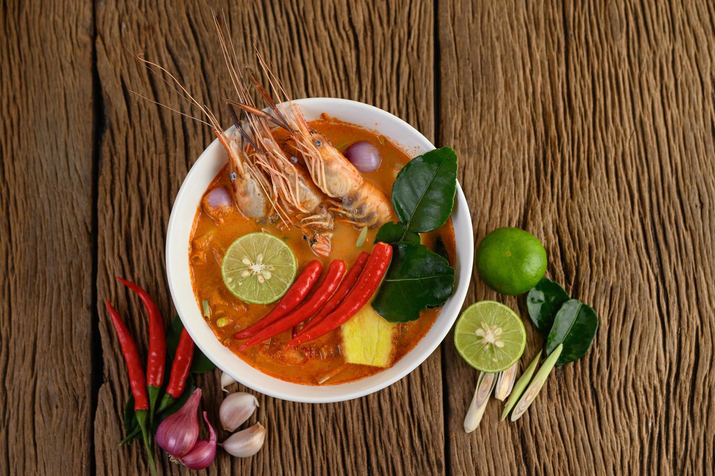 Hot and spicy tom yum kung Thai soup photo