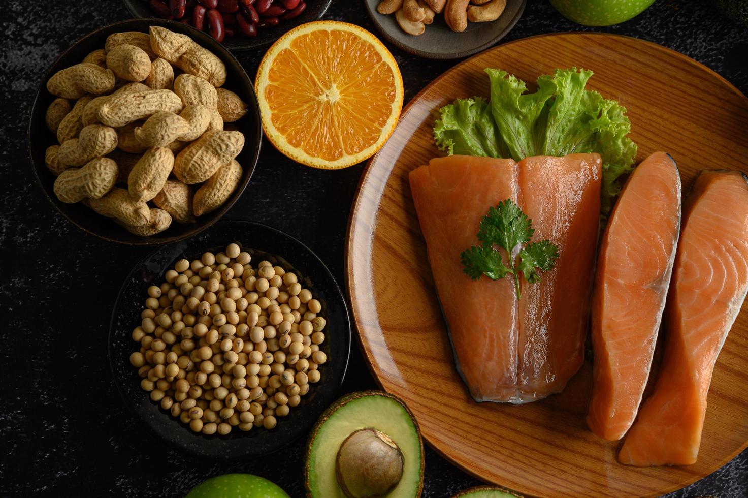 Legumes, fruit and salmon pieces photo