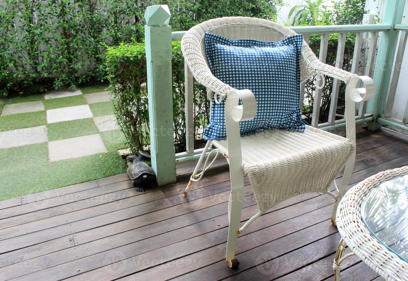 Wicker chair on a patio photo