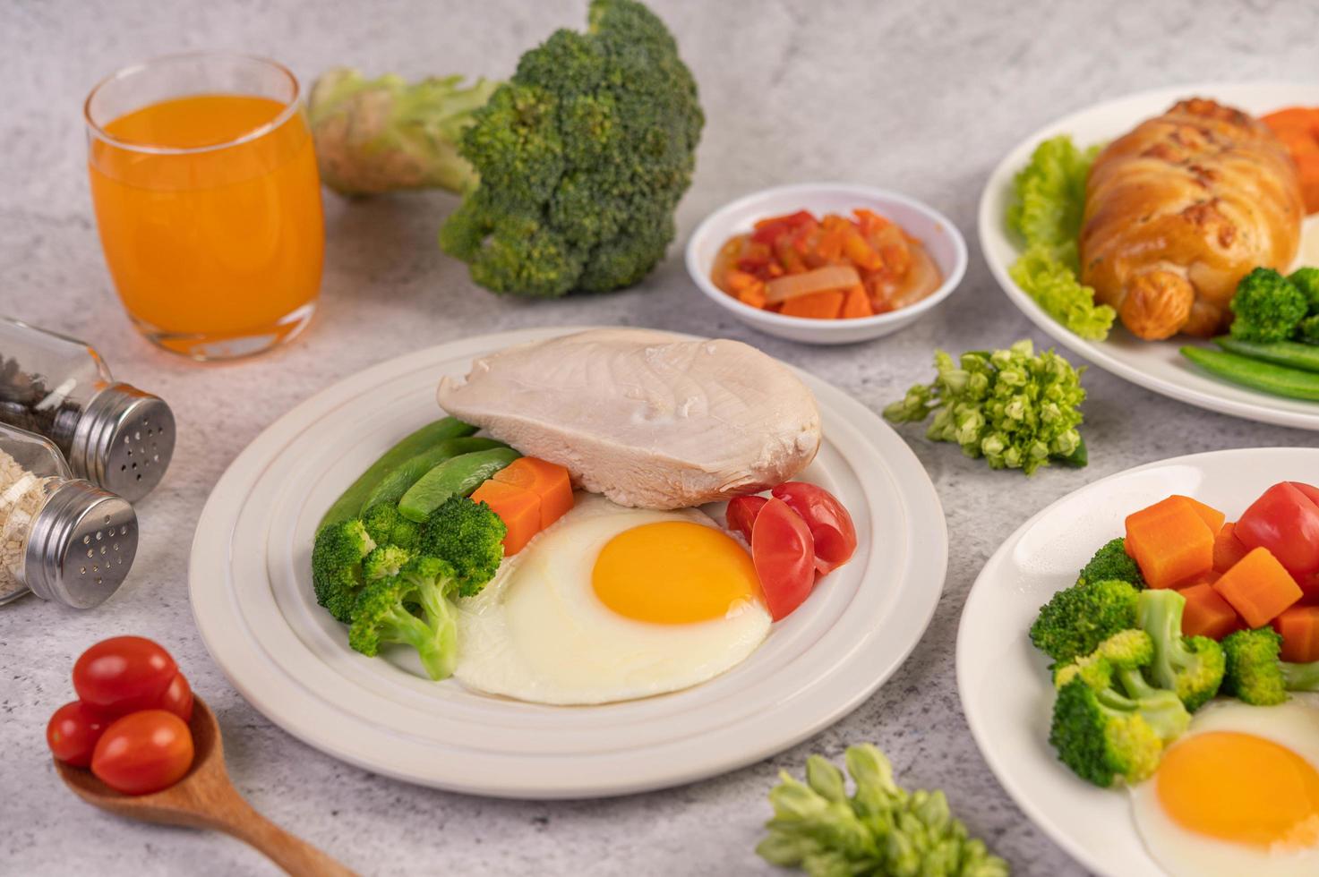 Fresh egg croissant and vegetable breakfast photo