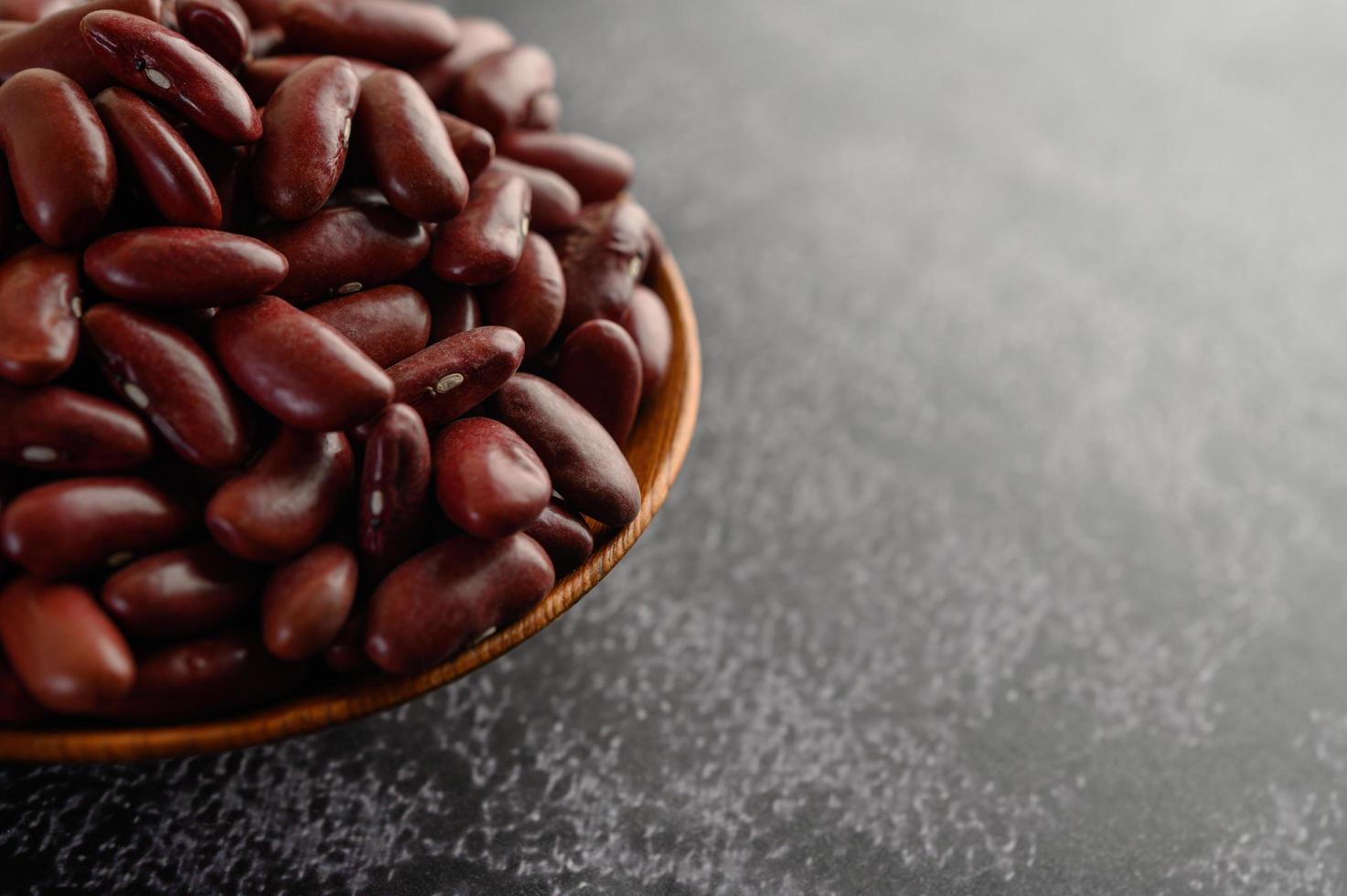 Red beans in a wooden bowl photo