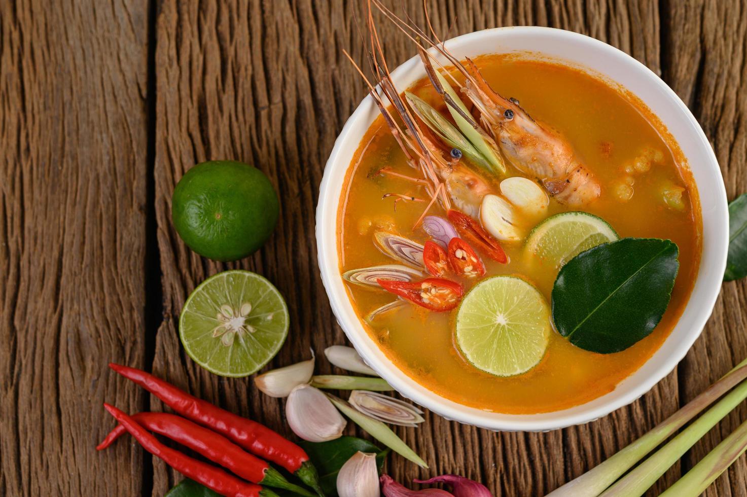 Hot and spicy tom yum kung Thai soup photo