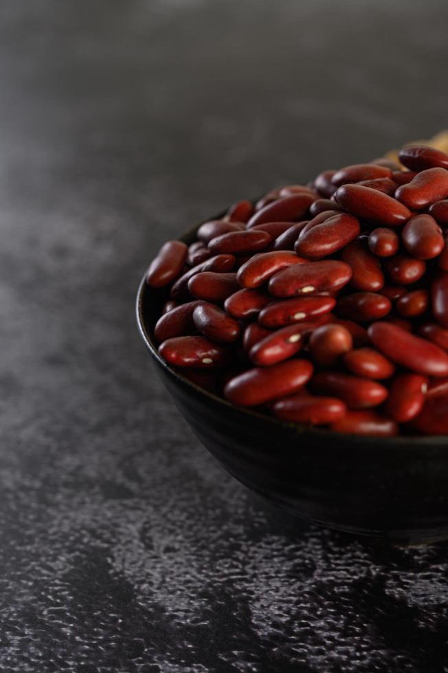 Red beans in a wooden bowl photo