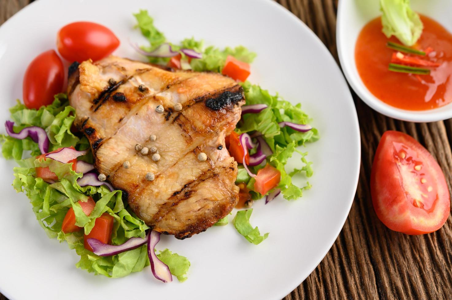 Grilled chicken with a salad photo