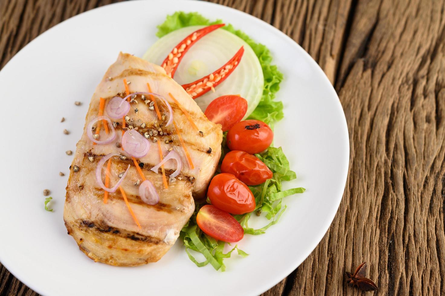 Grilled chicken with grilled vegetables and salad photo