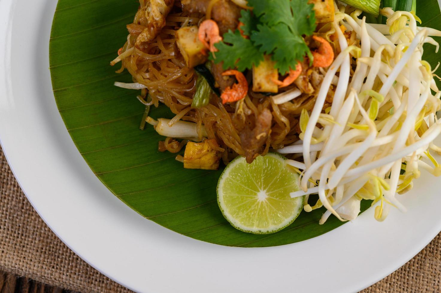 Pad Thai dish on a banana leaf photo