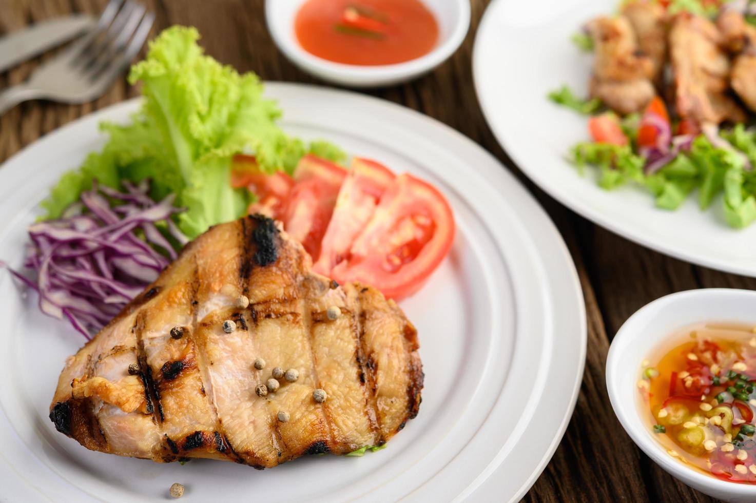 Grilled chicken with a salad photo