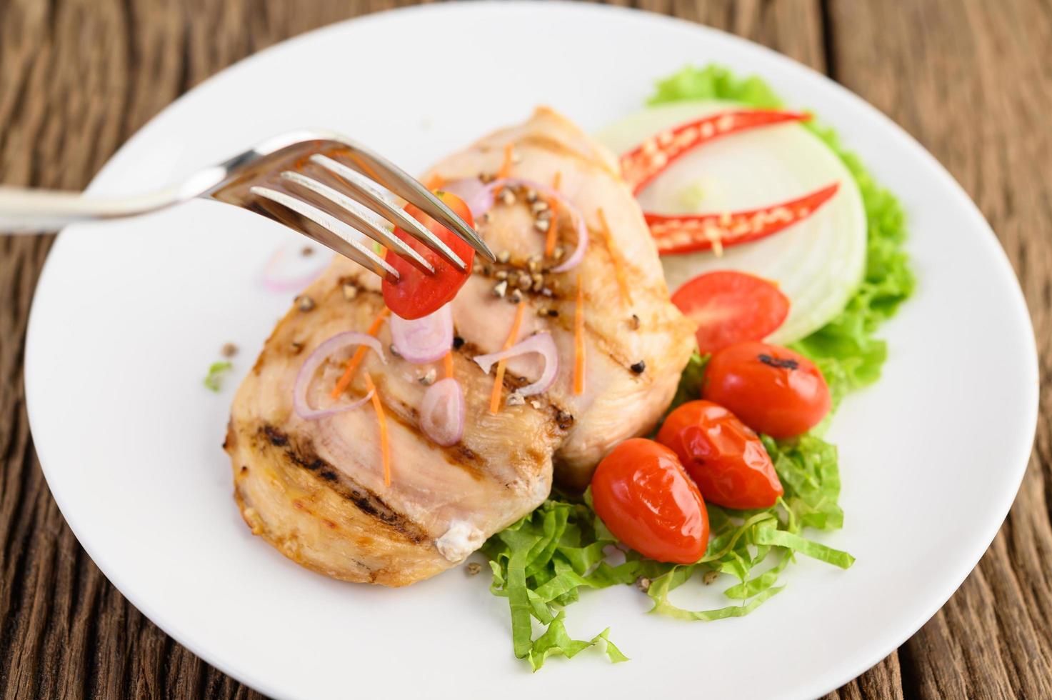 Grilled chicken with grilled vegetables and salad photo