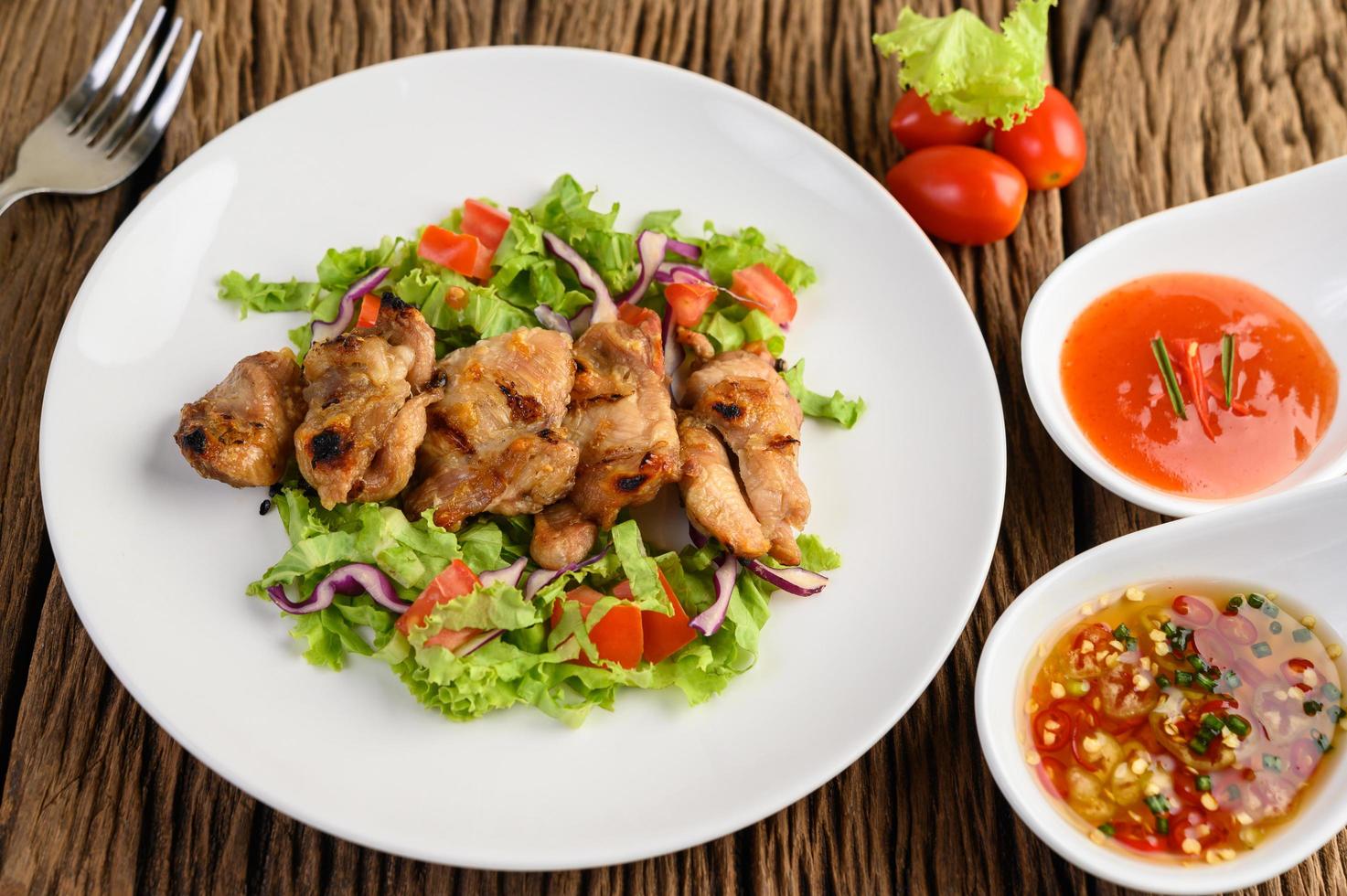 Grilled chicken with a salad photo