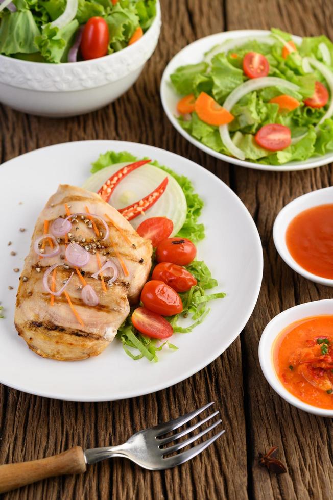 Grilled chicken with grilled vegetables and salad photo