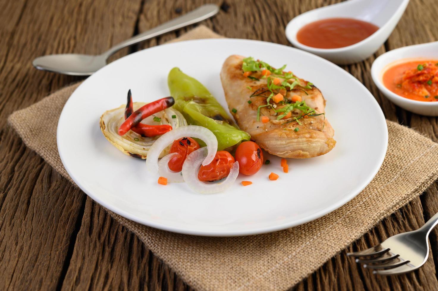 Grilled chicken with grilled vegetables and salad photo