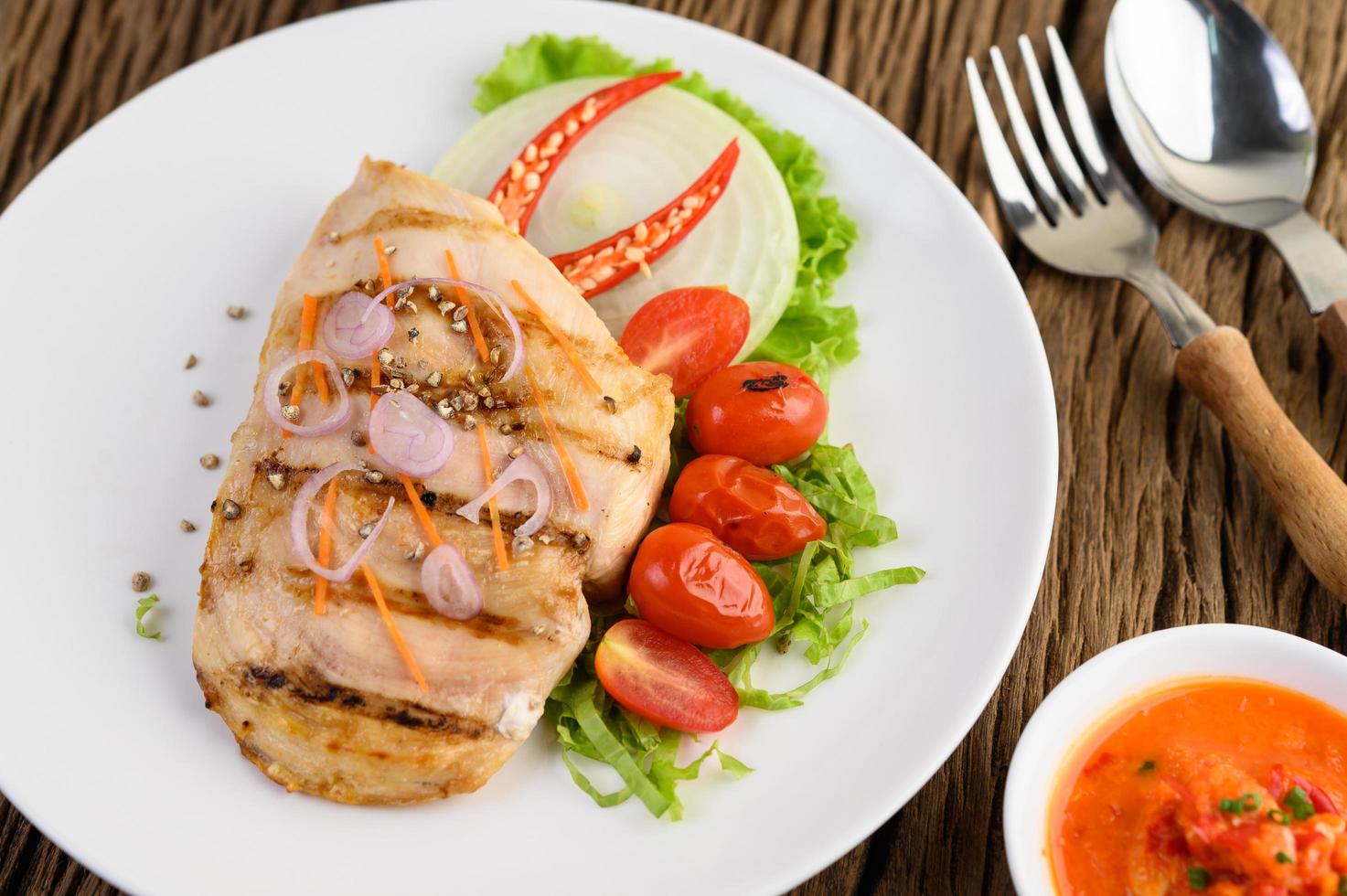 Grilled chicken with grilled vegetables and salad photo