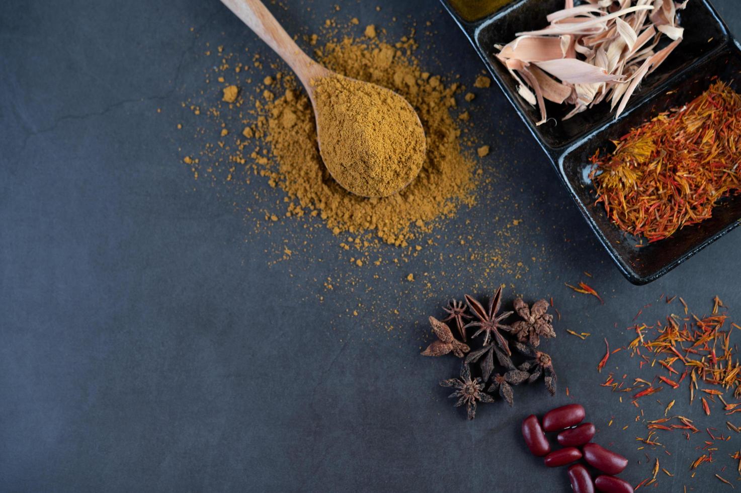 Spices on a gray kitchen surface photo