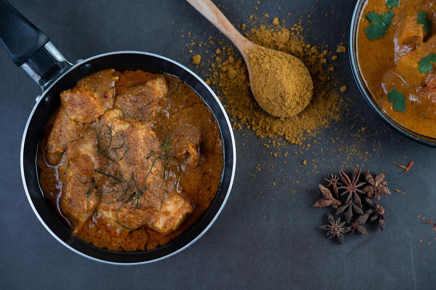 Massaman curry with traditional spices photo