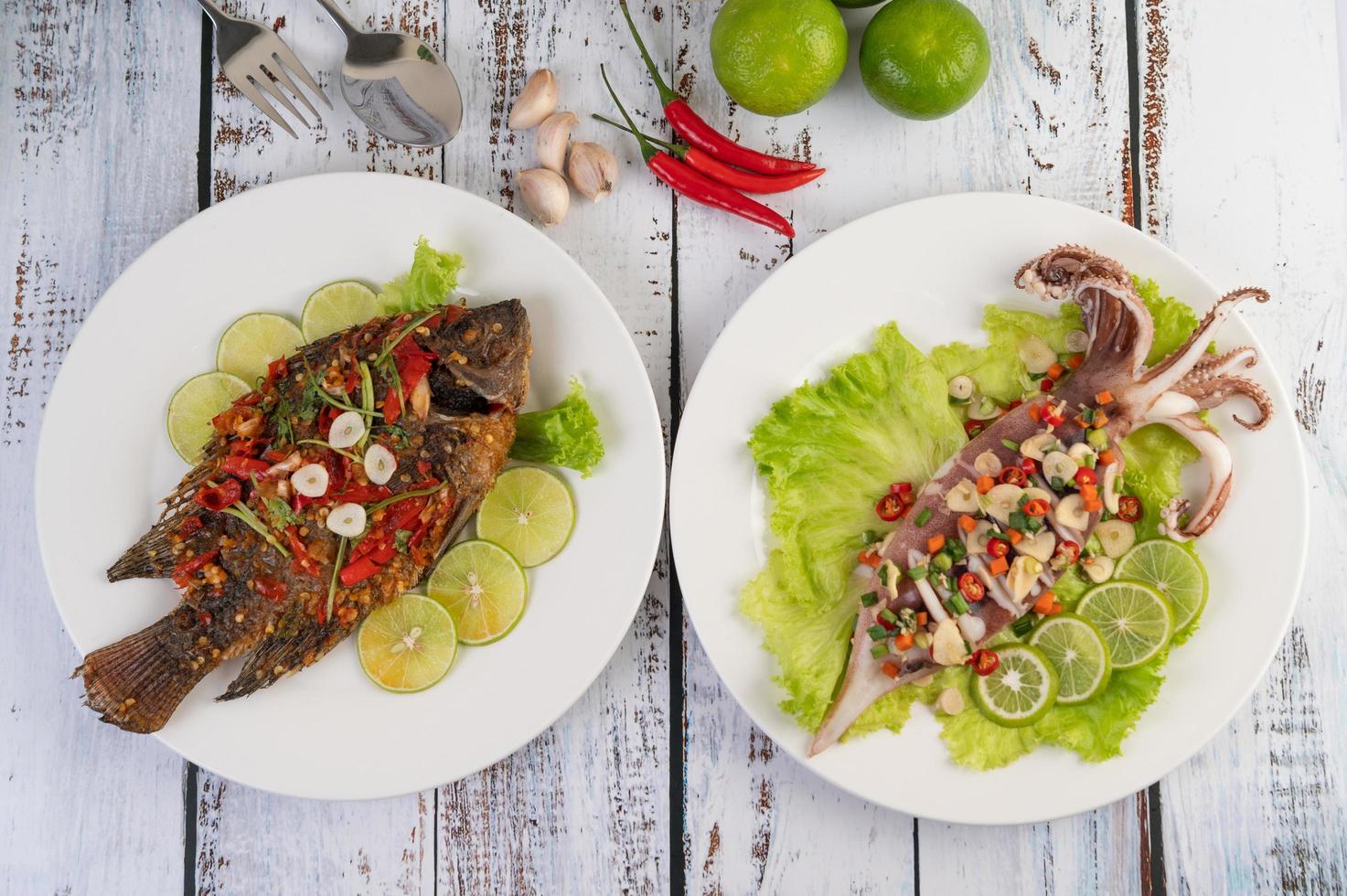 Tilapia fried with chili sauce and squid photo