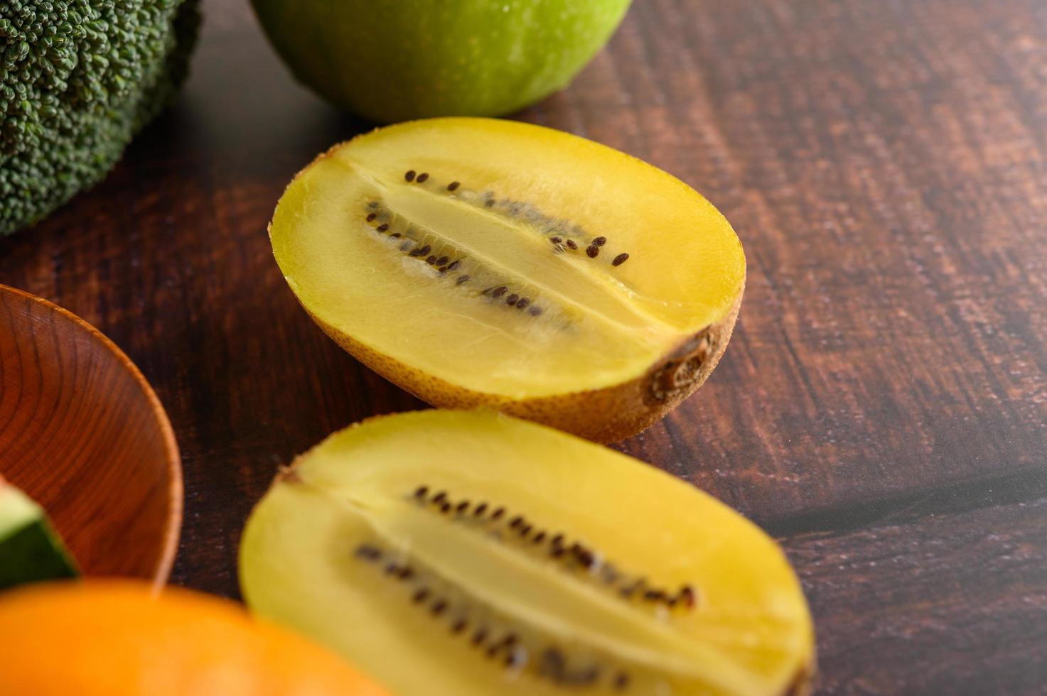 A half-cut yellow kiwi photo