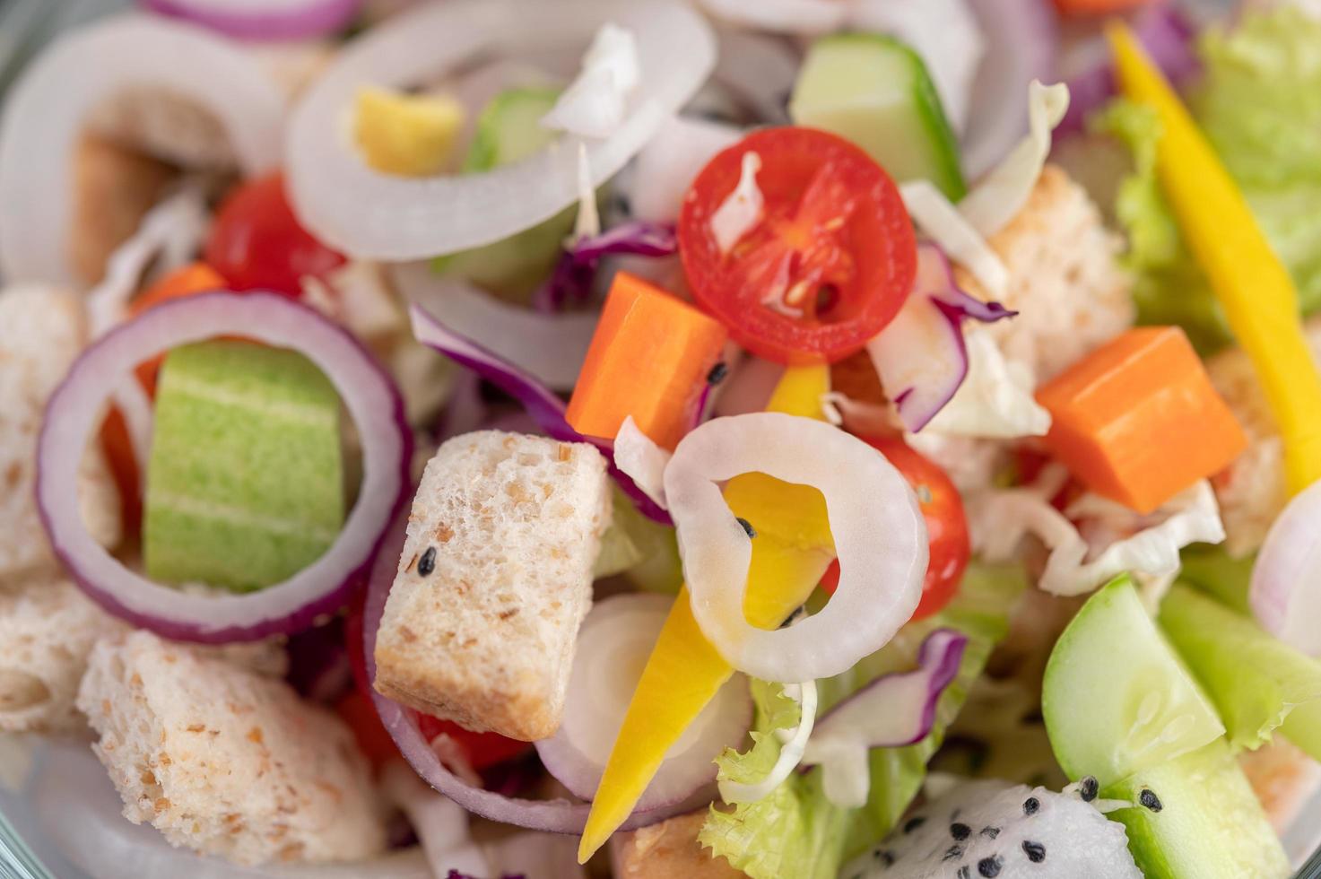 A plated salad with vegetables photo