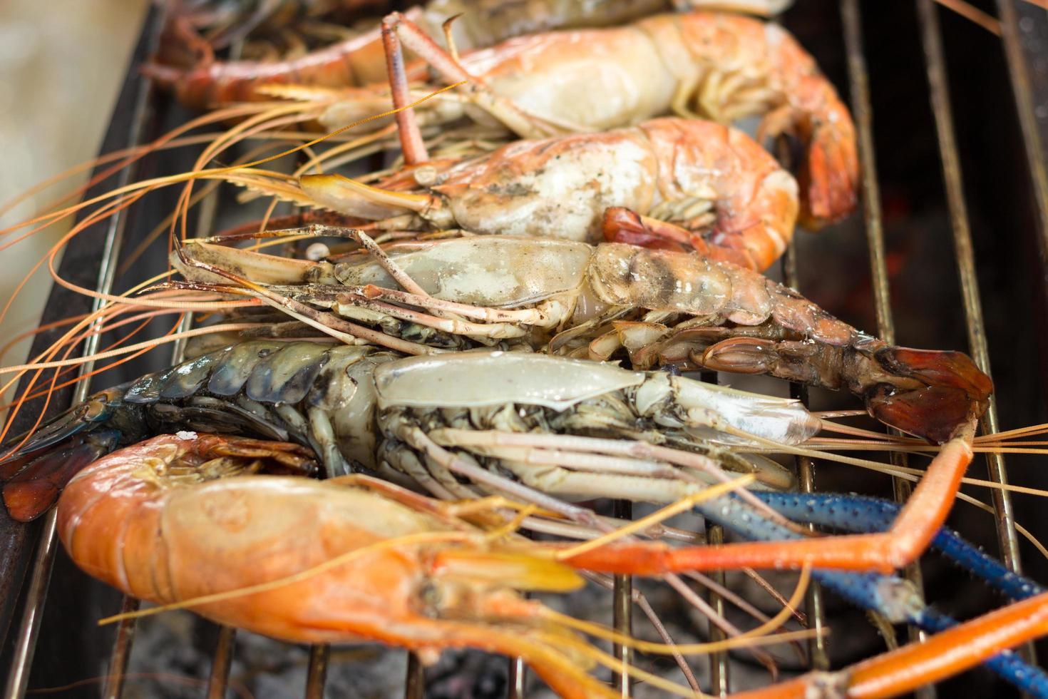 Close-up of prawns on the grill photo