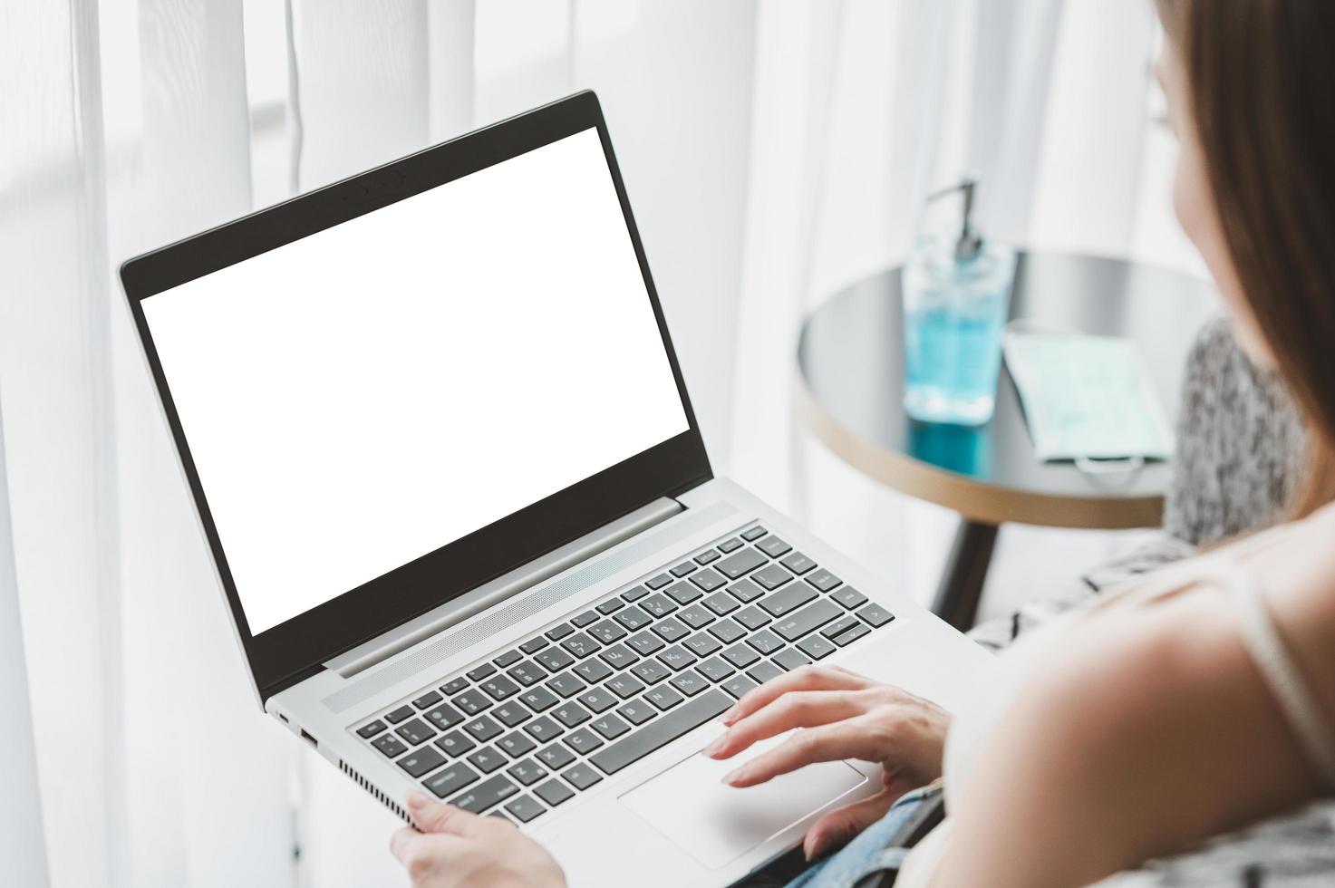 Woman using laptop mock-up photo