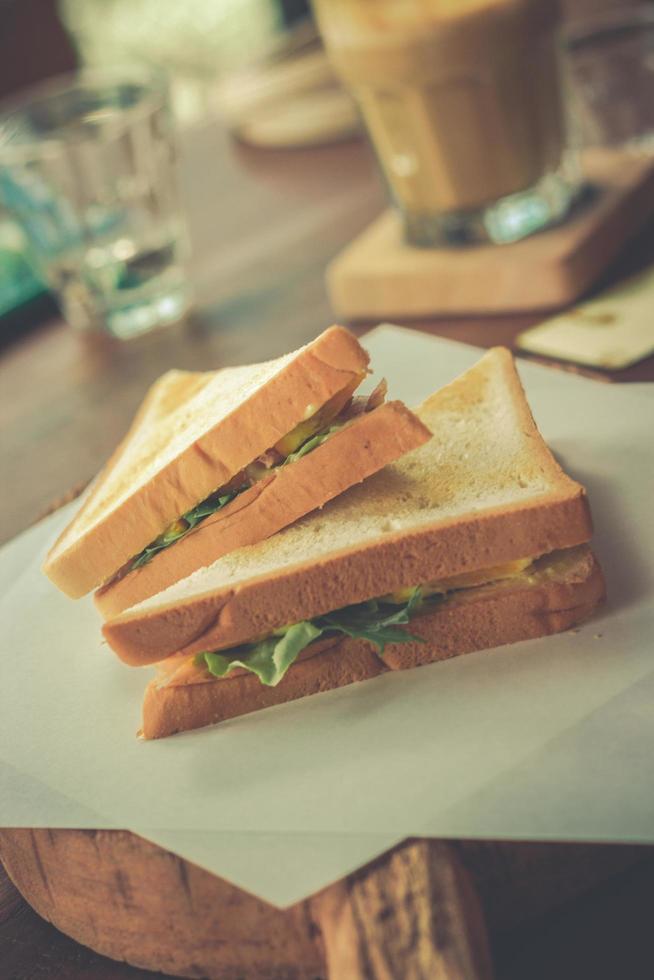 Bacon and vegetable sandwich on toast photo