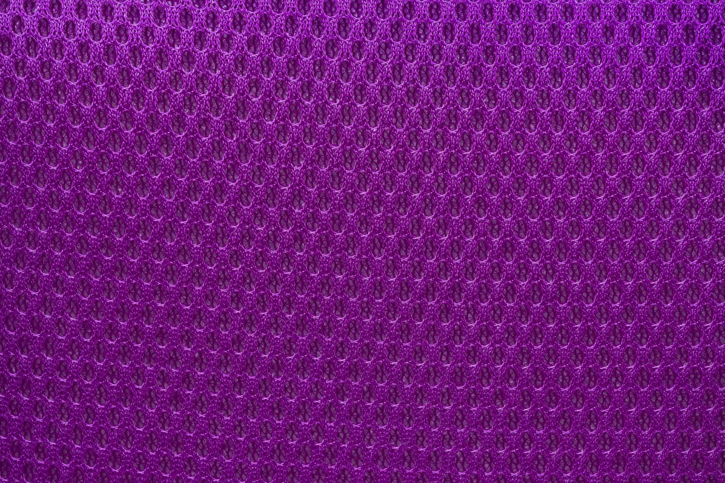 Violet nylon fabric textured background with hexagonal shape photo