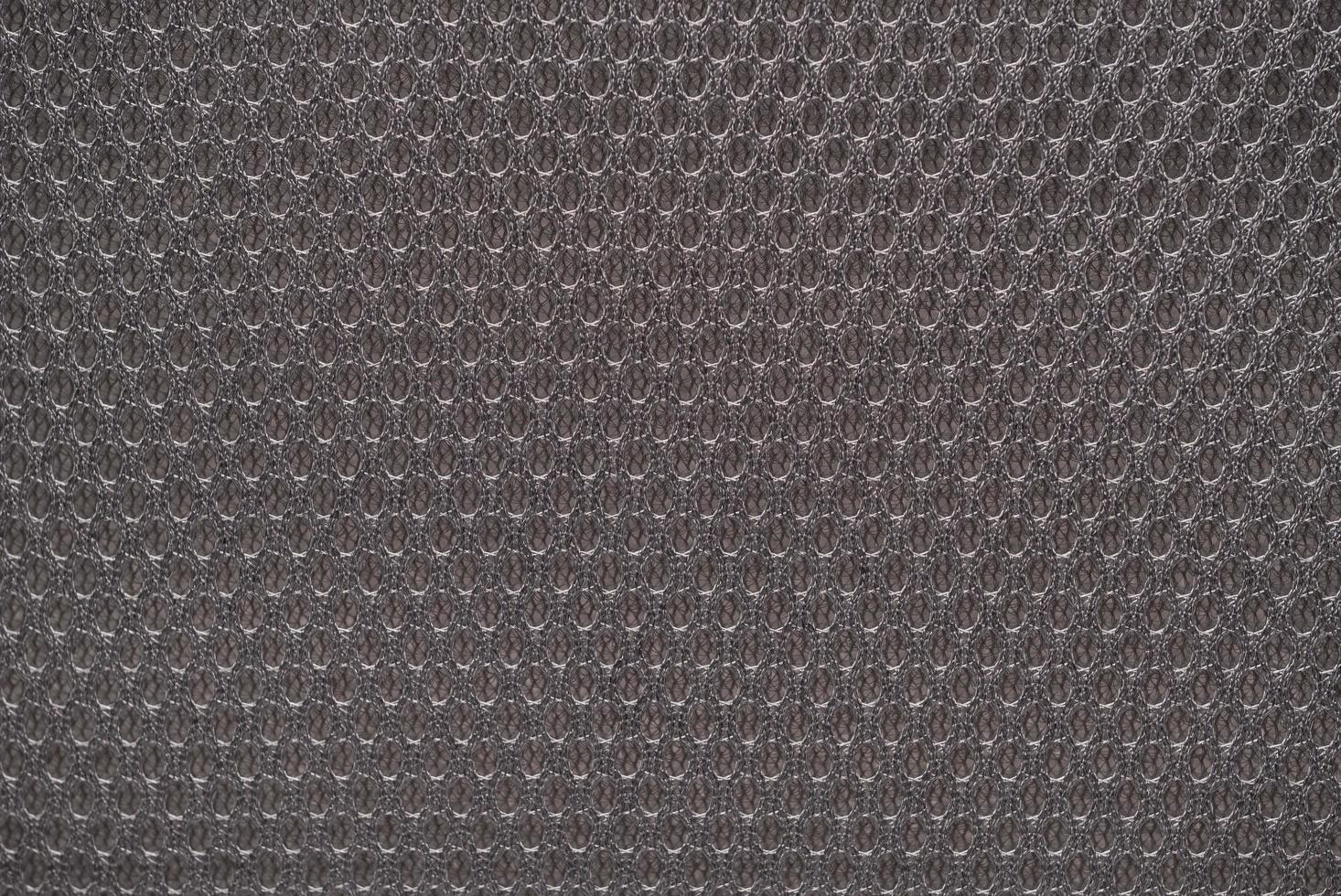 Fondo texturizado de tela de nailon gris con forma hexagonal foto