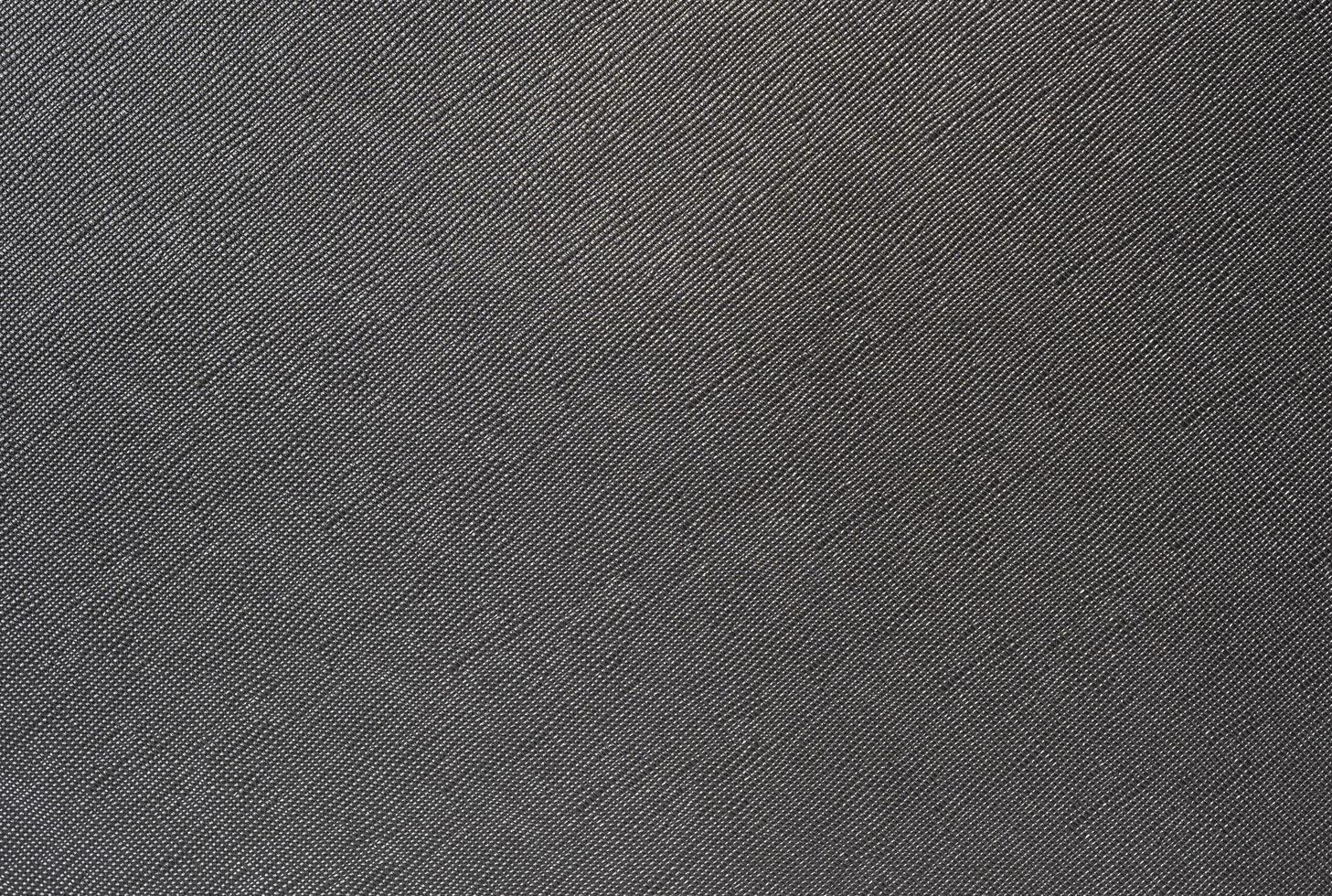 Grey background from a textile material with wicker pattern, closeup. photo
