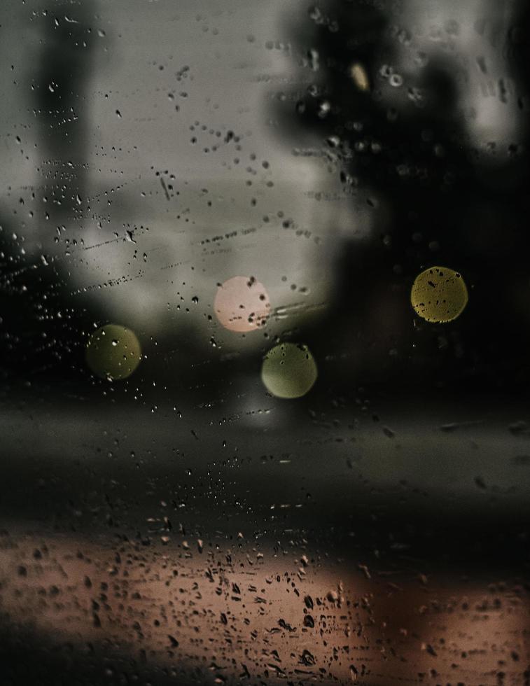 Water droplets on glass window photo