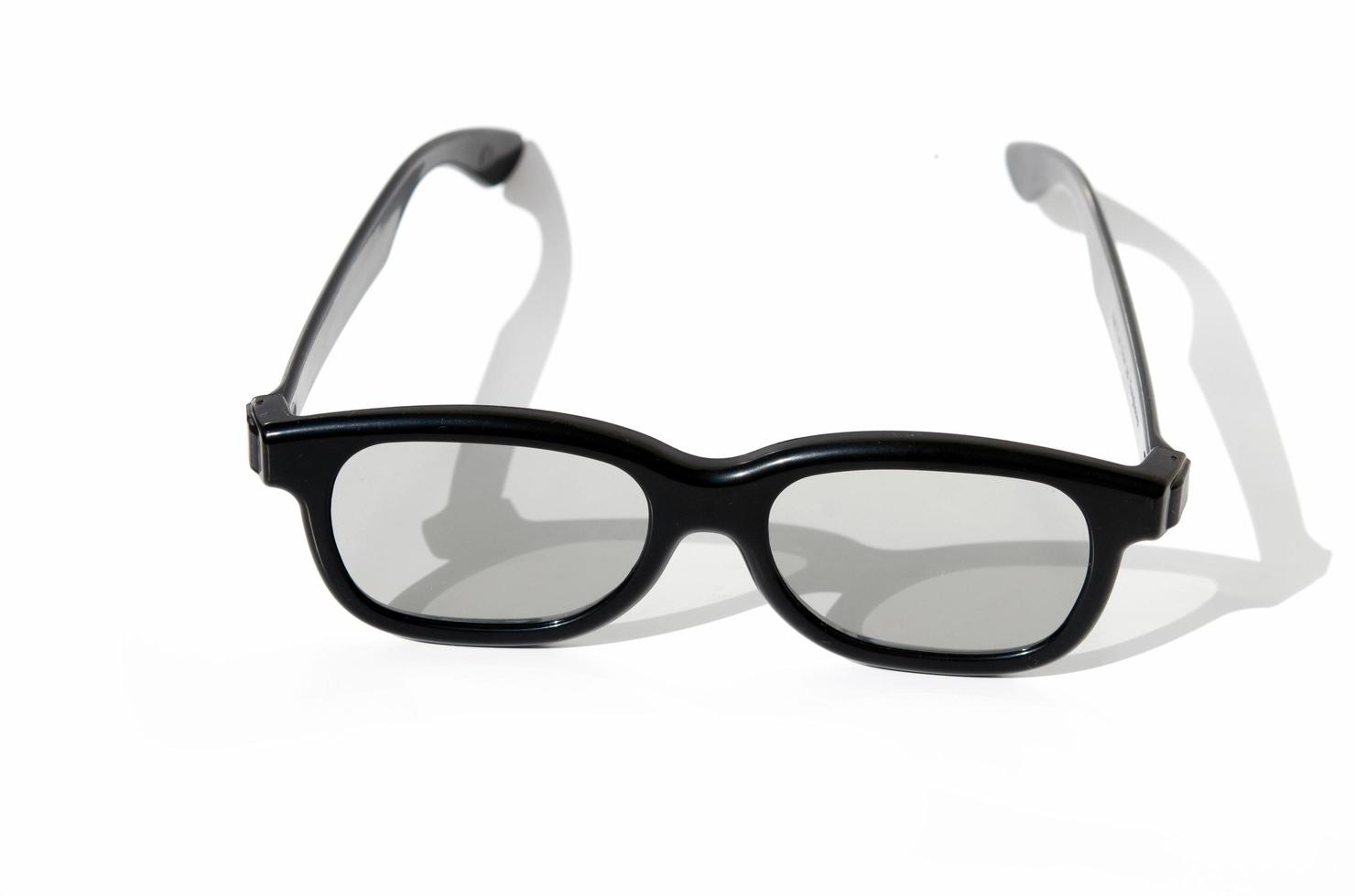 Black glasses on white background photo