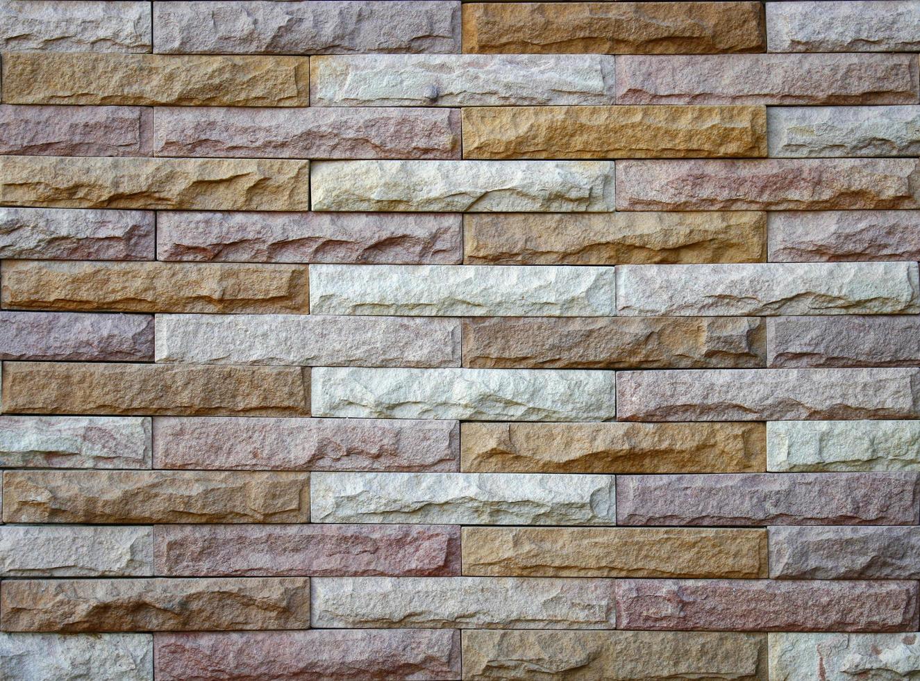 Background of stone wall made with blocks photo