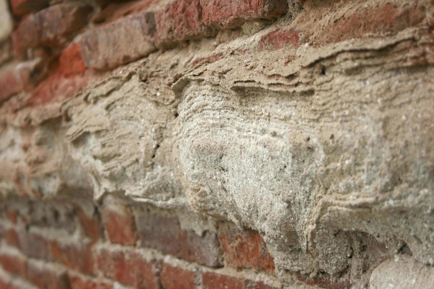 Red rustic brick wall photo