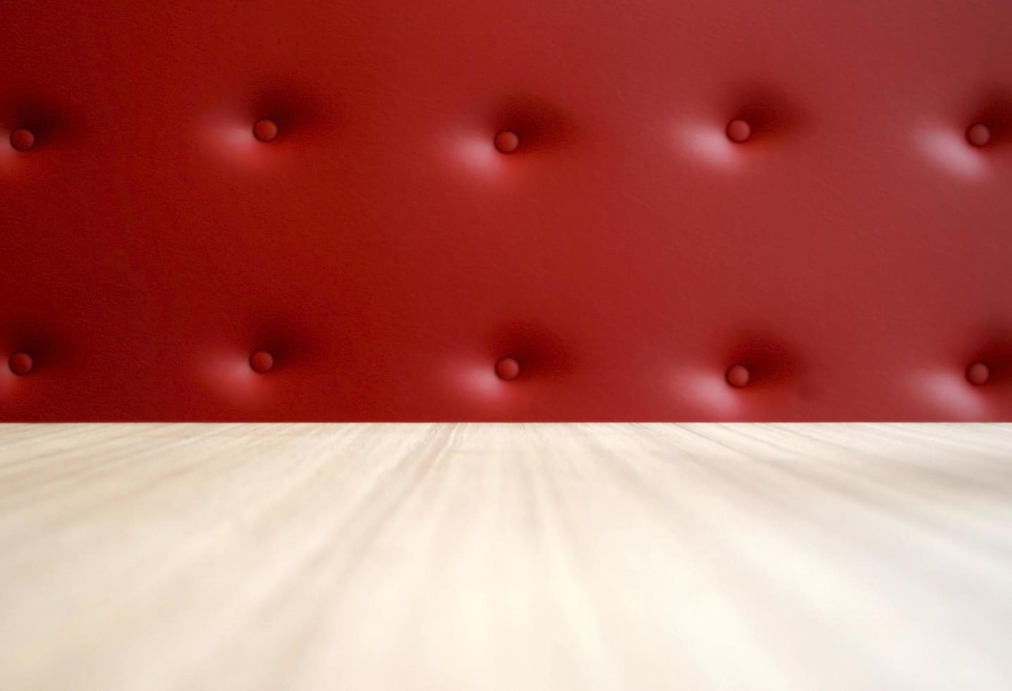 Red leather and wooden table photo