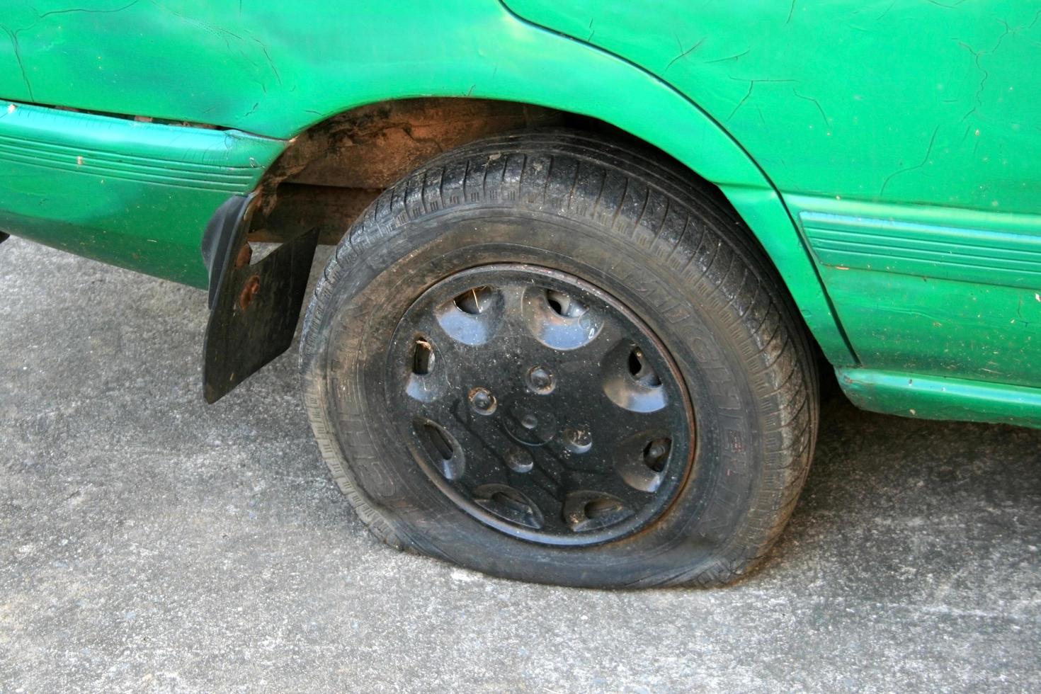 Flat  tire on car photo