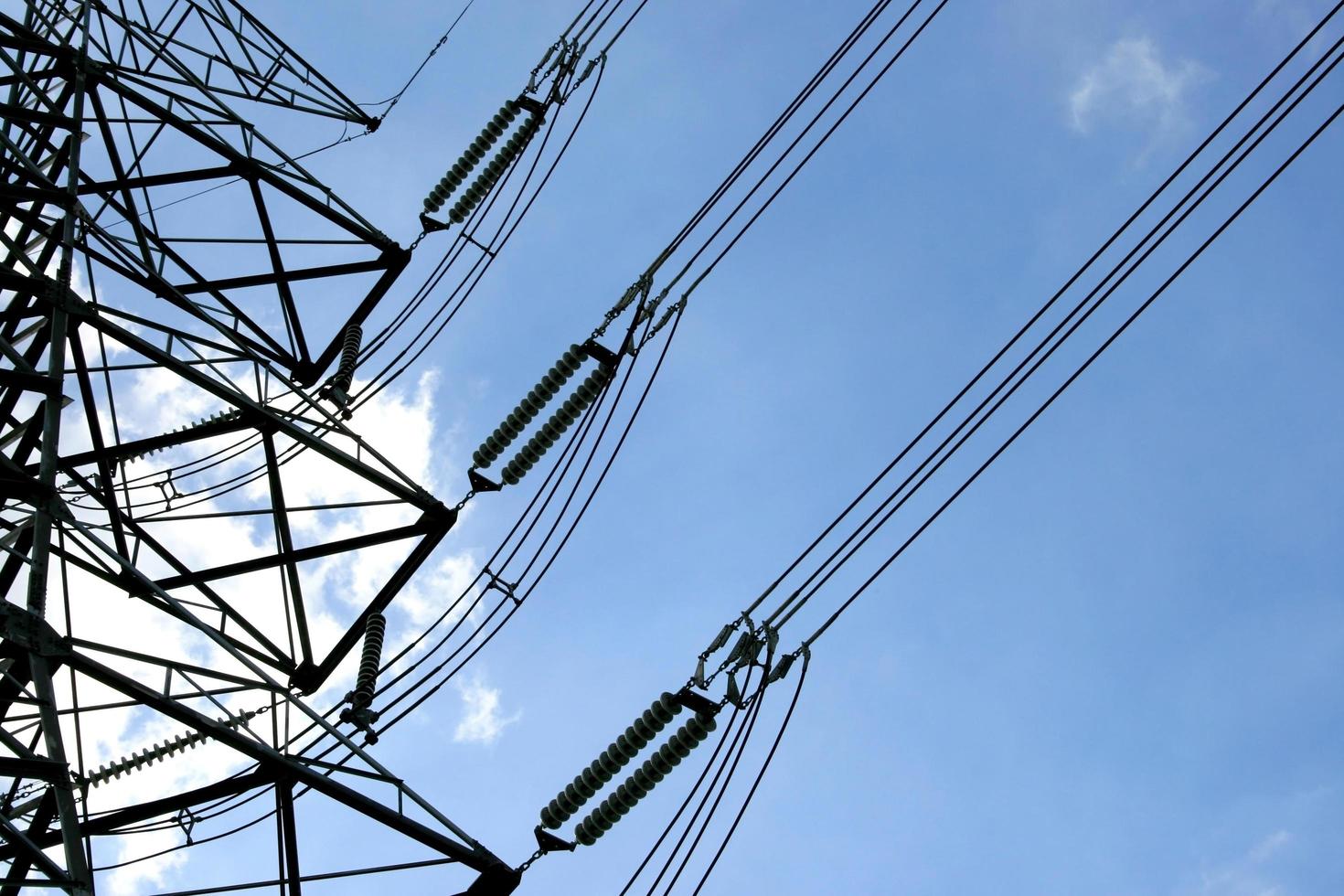 Blue sky and telephone wires photo