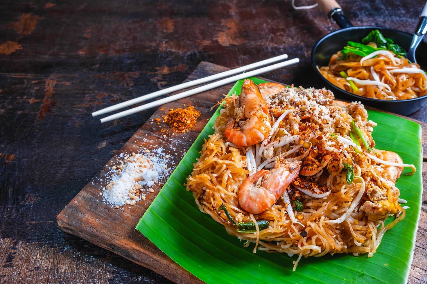 Fried noodles on table photo