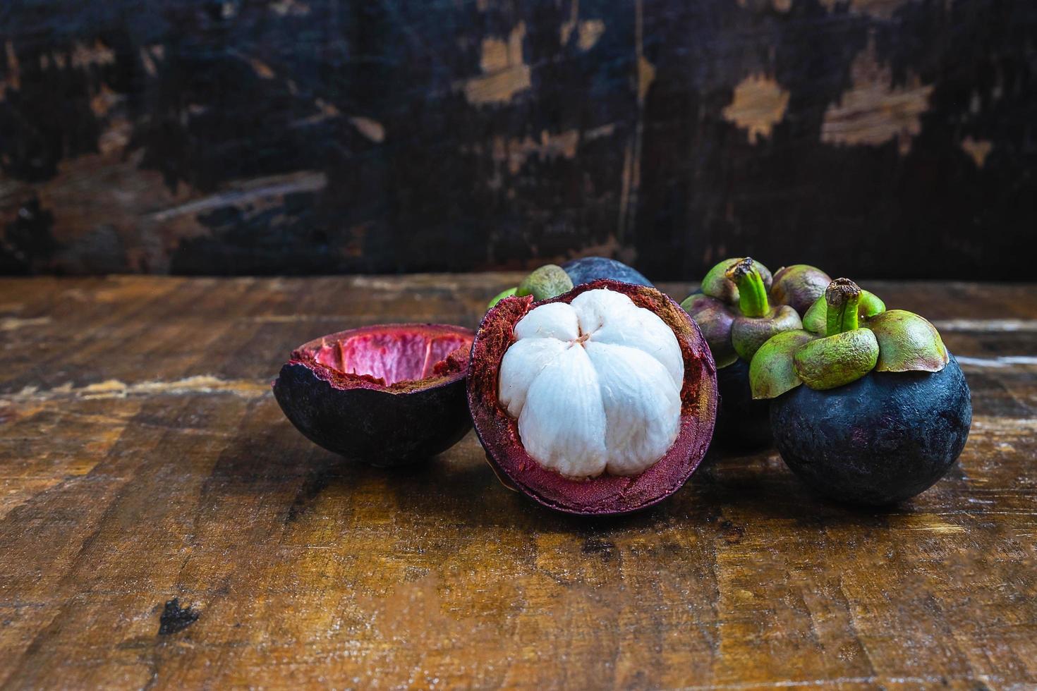 Mangosteen on wooden table photo