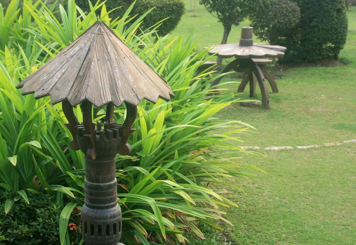 Thailand, 2020 - Stone lanterns in garden photo