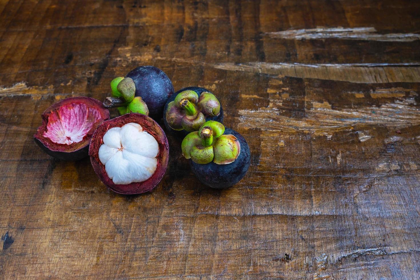 Fruit on a wooden table photo