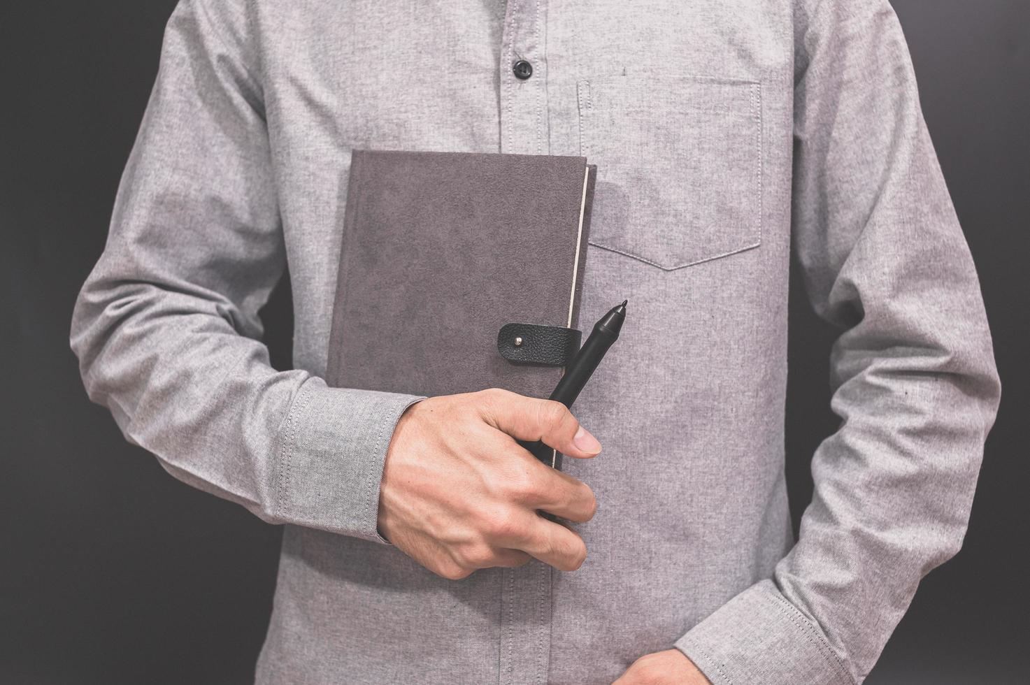 Hand holding a book photo