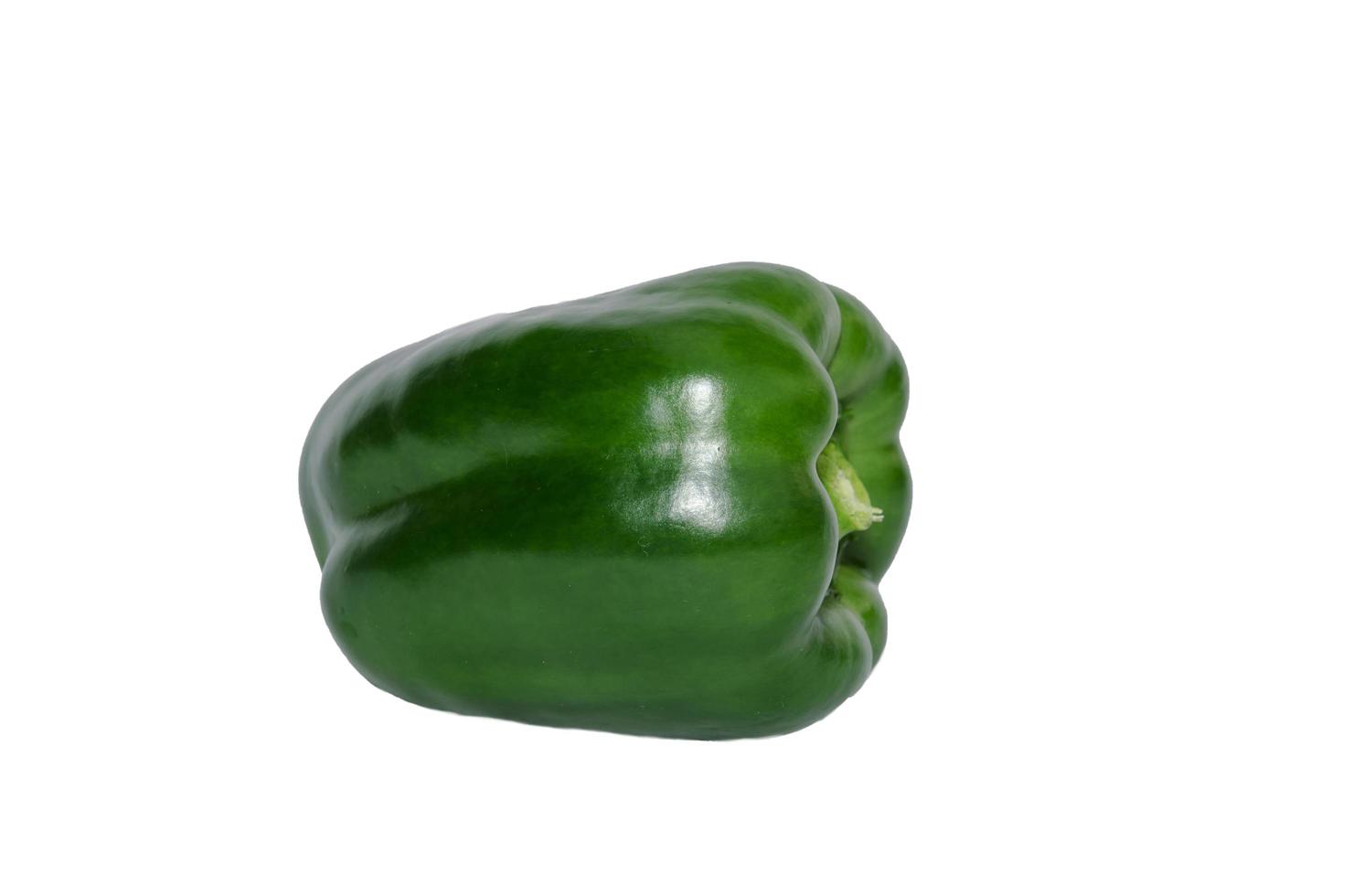 Green bell pepper on white background photo