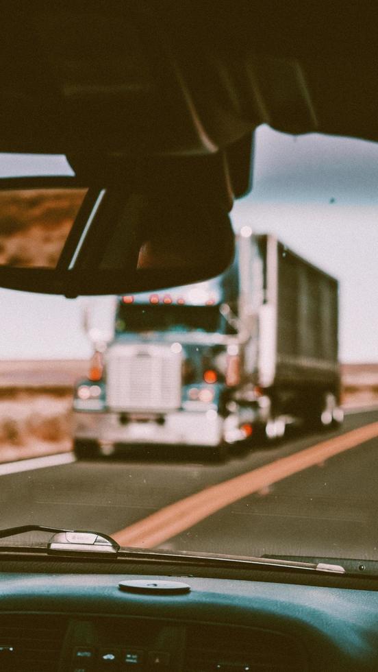 White truck on road during daytime photo