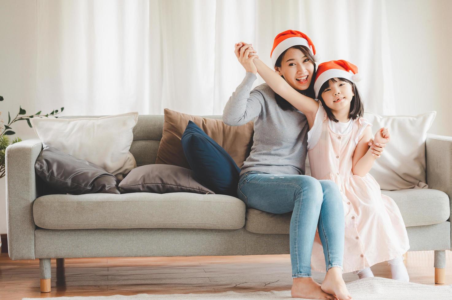 Mom and daughter celebrating Christmas photo