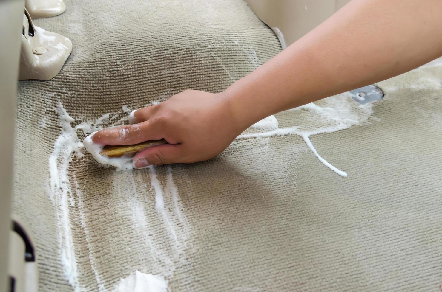 Washing the car carpet photo