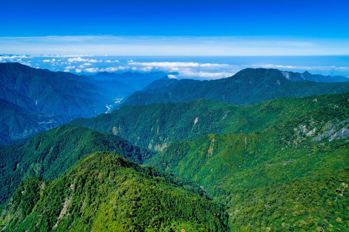 Green mountains during the day photo