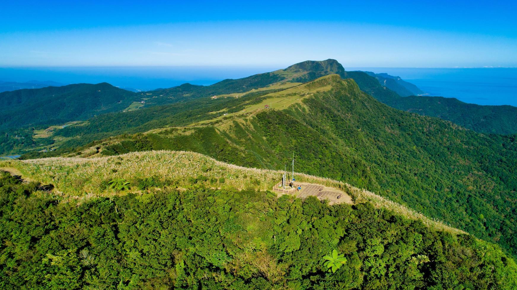 Green hills and blue sky photo