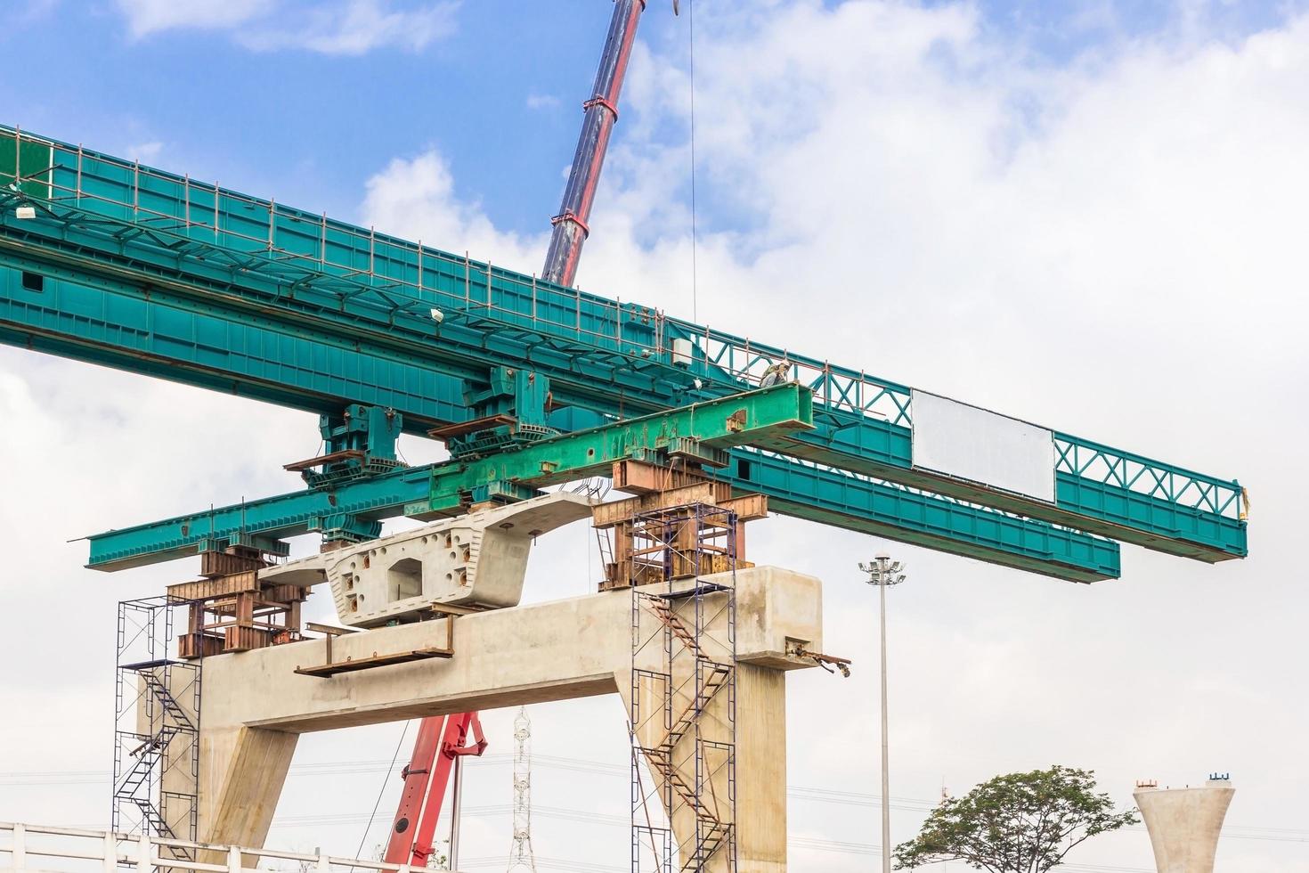 Bridge construction with a crane photo