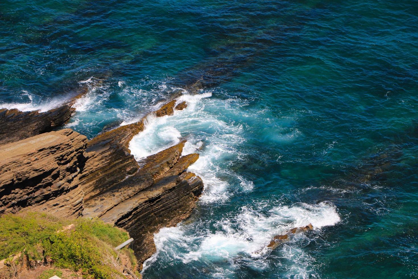 Blue ocean with rocks photo