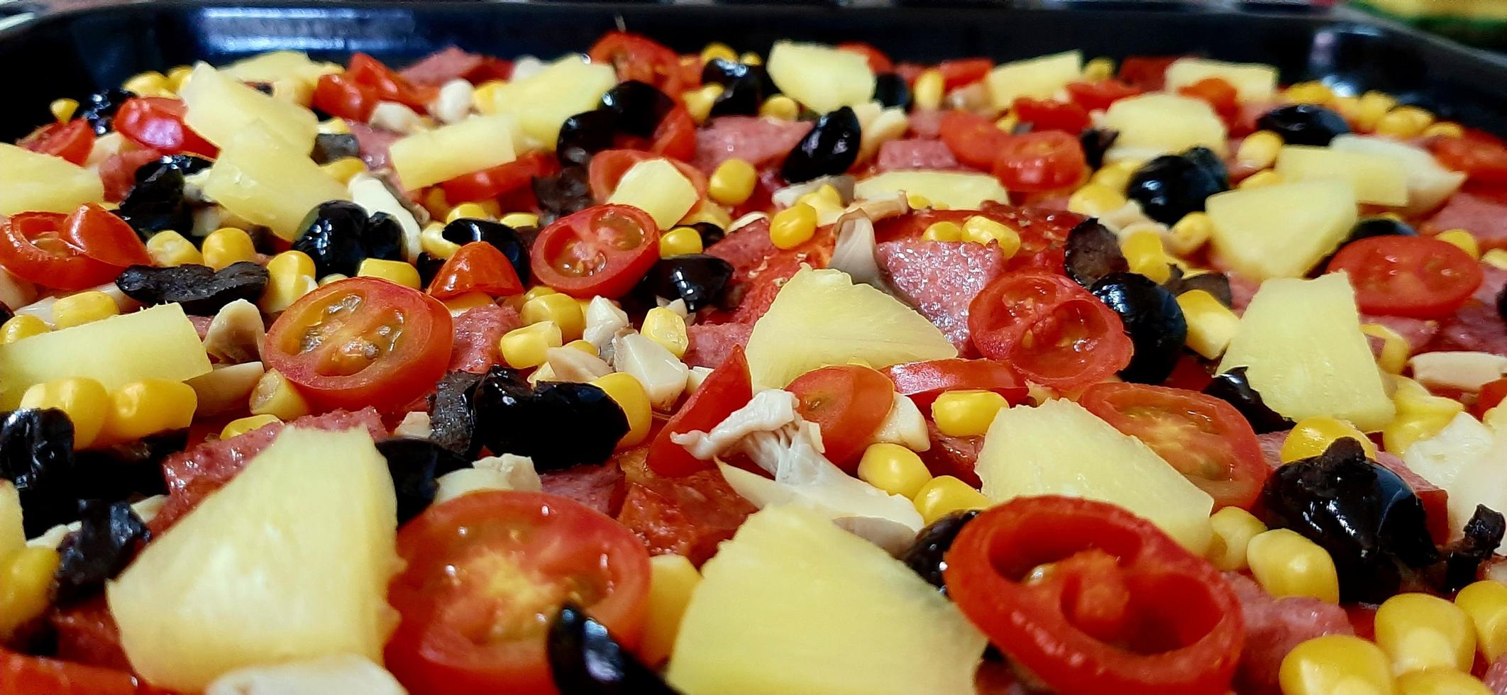 Close-up of pizza toppings photo