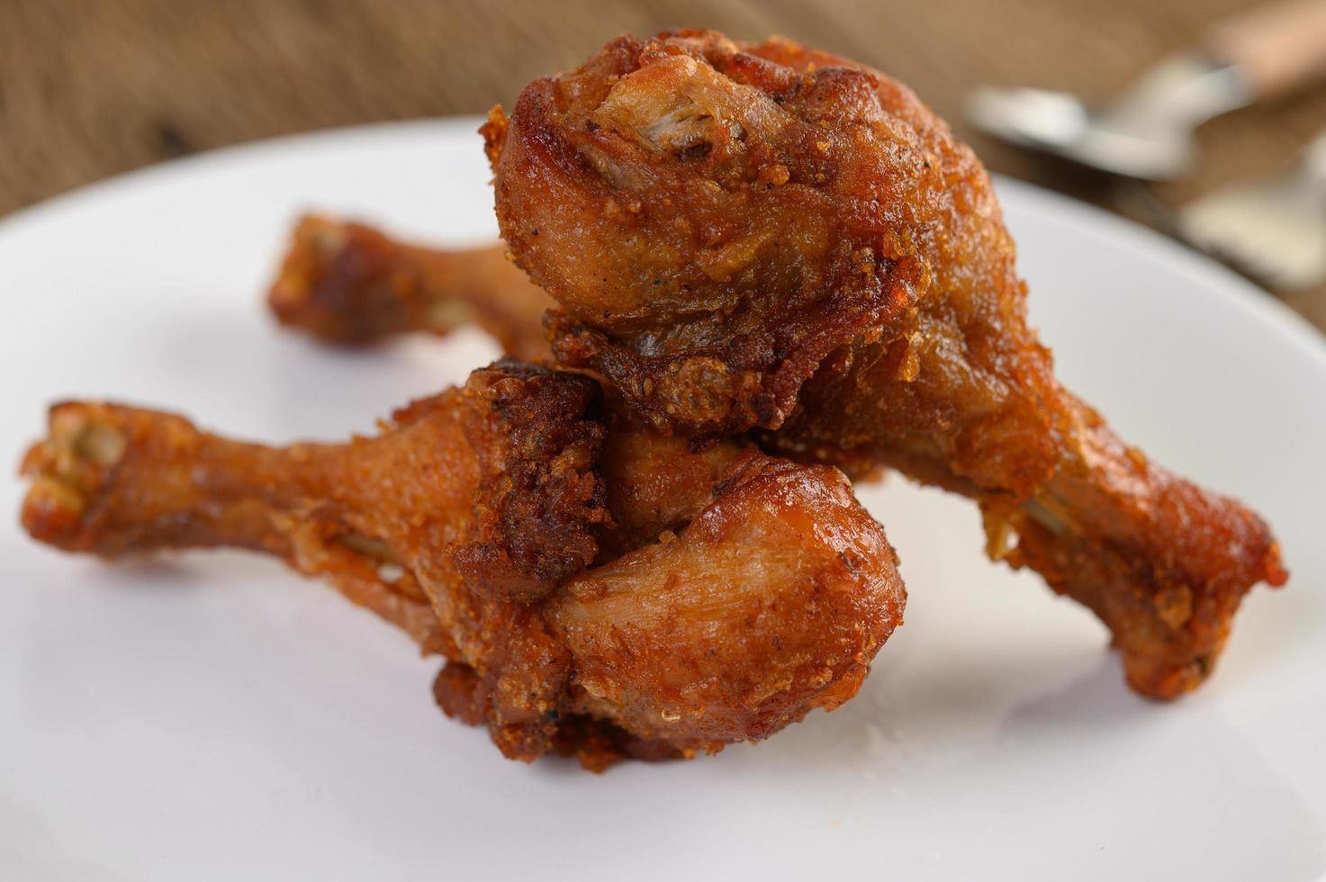 Fried chicken on a white plate photo